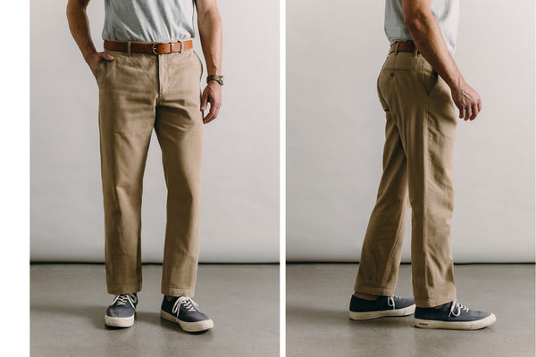 Split shot showing our guy from the front and back, in a Democratic fit selvedge jeans and a plain white tee.