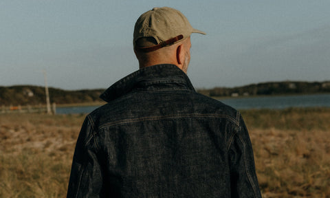 fit model walking wearing the Long Haul Jacket in Rinsed Organic Selvedge