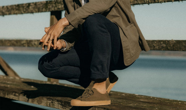 fit model posing in The Democratic Foundation Pant in Organic Dark Navy