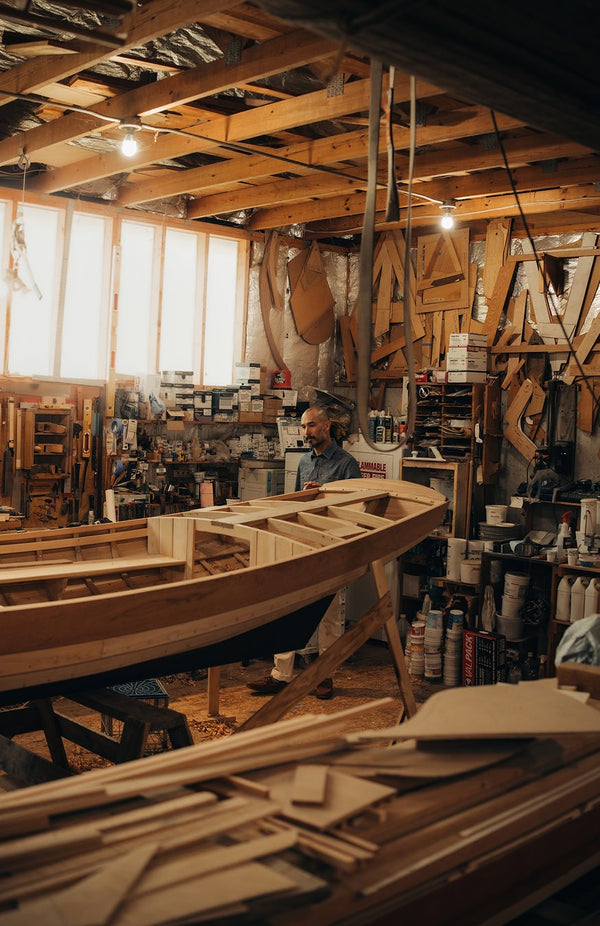 Interior of The Old Wharf Dory, featuring boatmaking materials