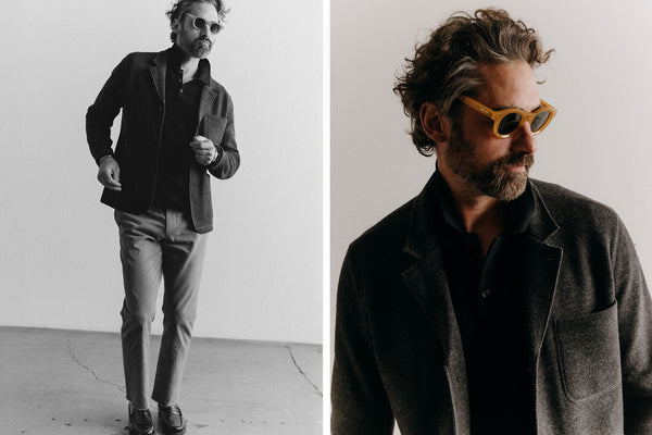 fit model posing in The Stevens Sportcoat in Slate Herringbone Wool