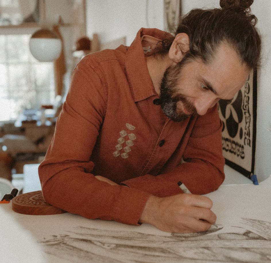 Daren sketching out his designs