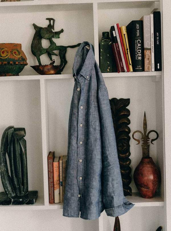 The Jack in Sky Stripe Linen, hanging on a bookshelf