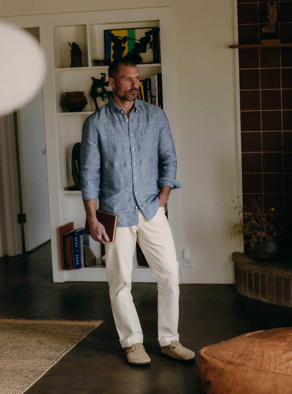 Model wearing The Jack in Sky Stripe Linen with white jeans