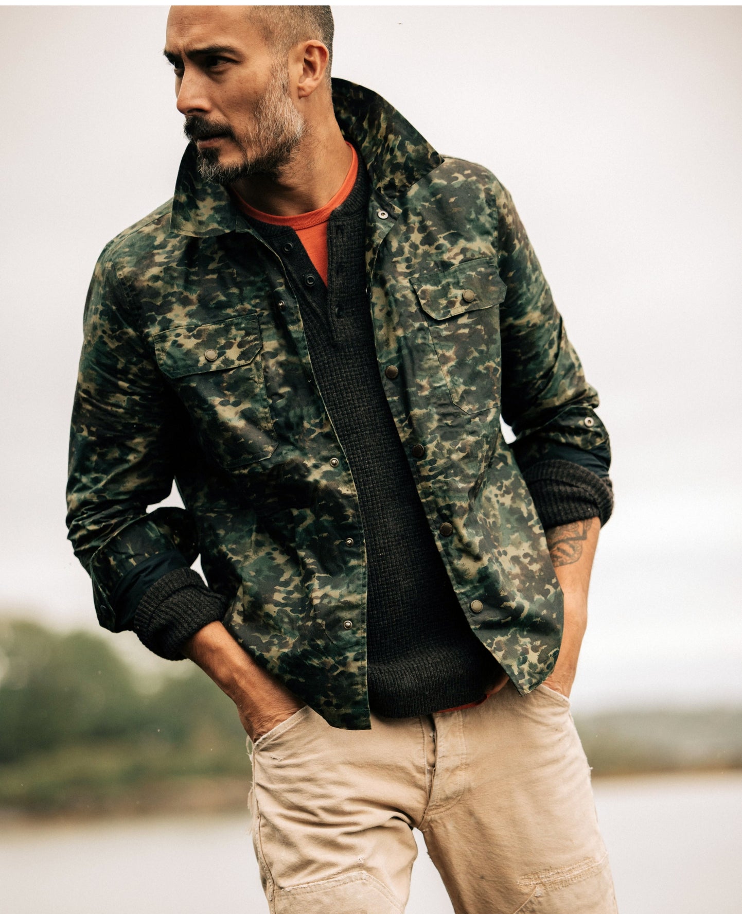 Model wearing thr TS x Danner styles