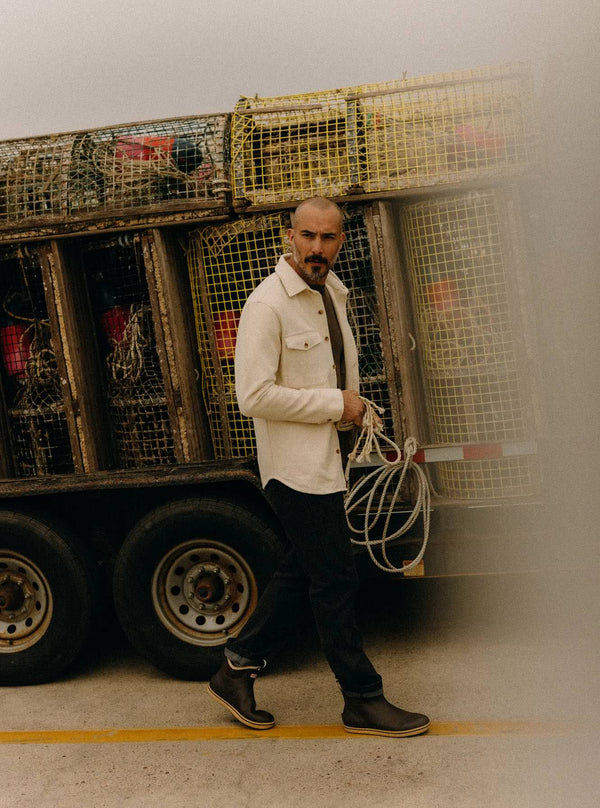 Model wearing The Maritime Shirt Jacket in Vintage White Moleskin and The Camp Pant in Coal Chipped Canvas