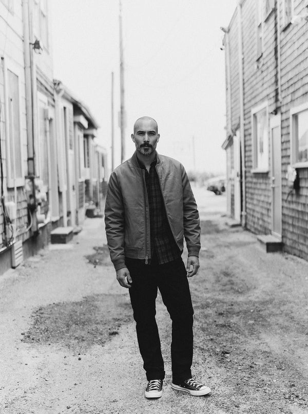 Model wearing The Insulated Bomber Jacket in Fatigue Olive